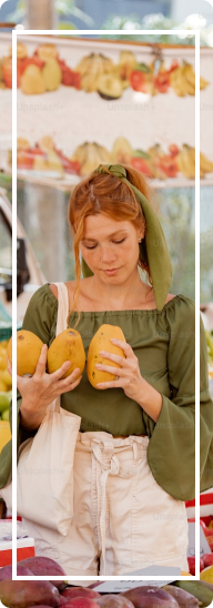 girl with fruits around her